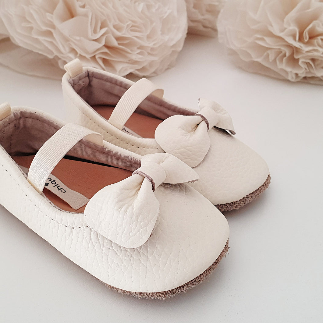 THE IVORY BOW FLATS