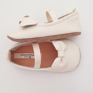 THE IVORY BOW FLATS